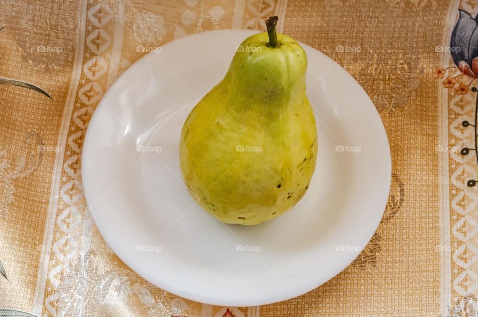 Pear-shape Guava In A Small Plate