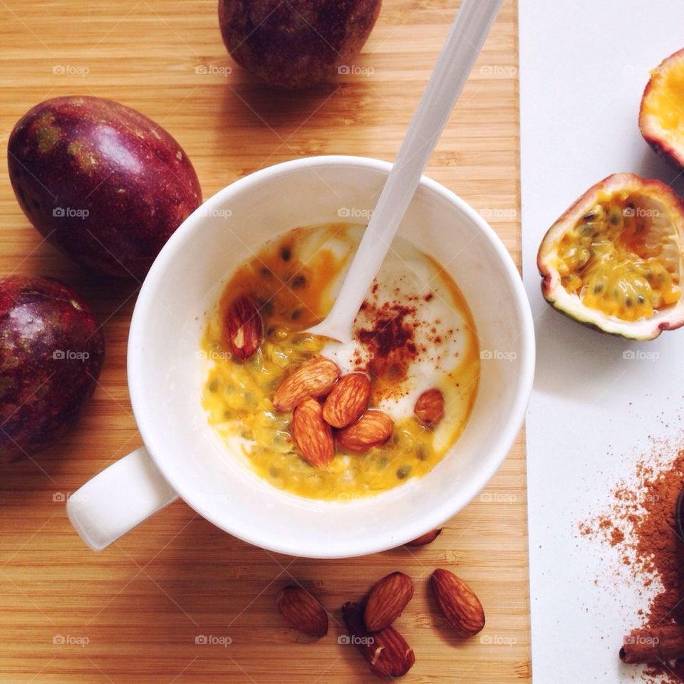Breakfast with yogurt and passion fruit