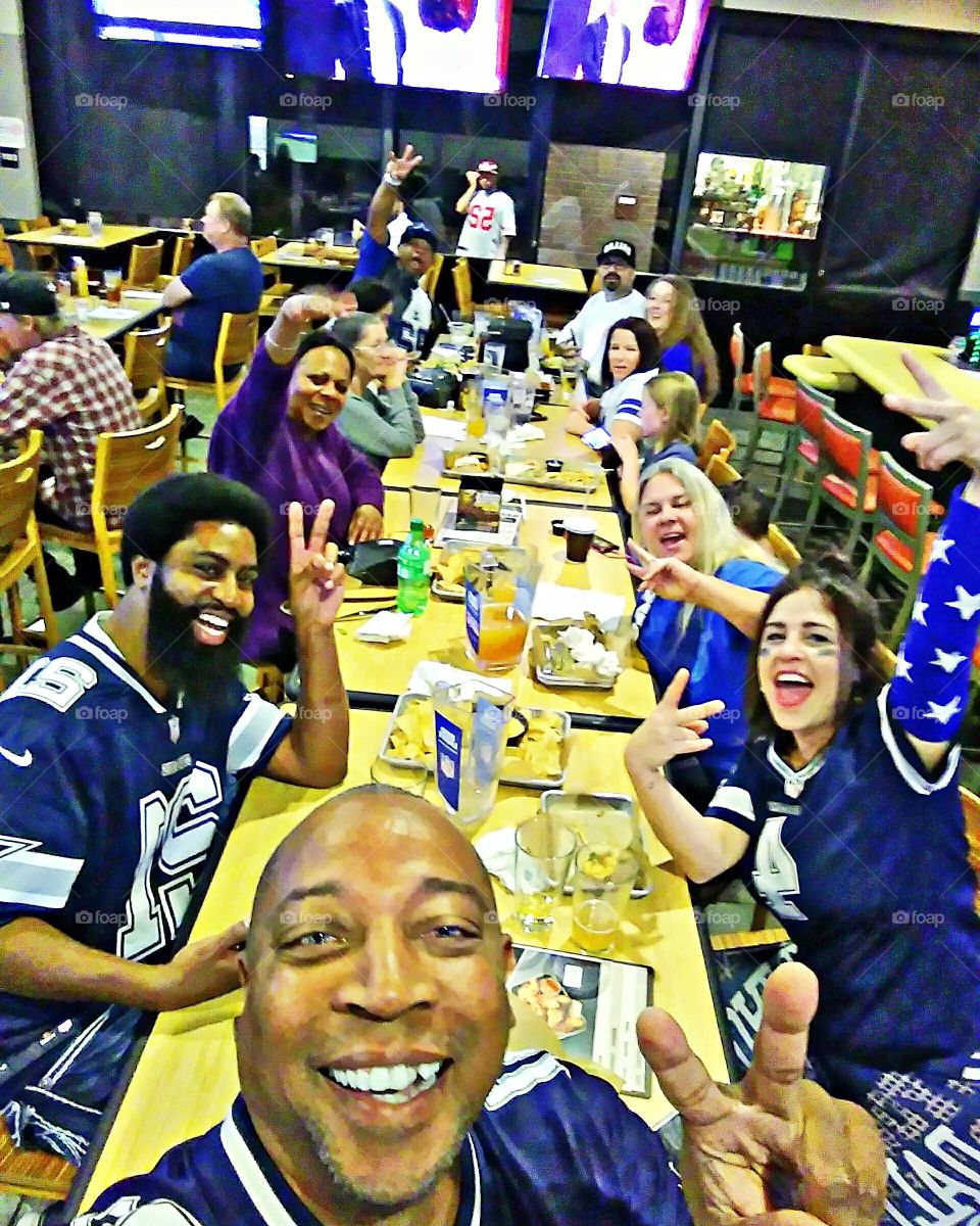 51st birthday party. celebration, eating, smiles, smiling. enjoying my 51st birthday party with my new Dallas Cowboy friends at Buffalo Wild Wings on Sunrise in Sacramento California