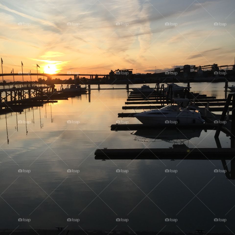 Beautiful vibrant sunset off the Fraser river on a warm summer evening