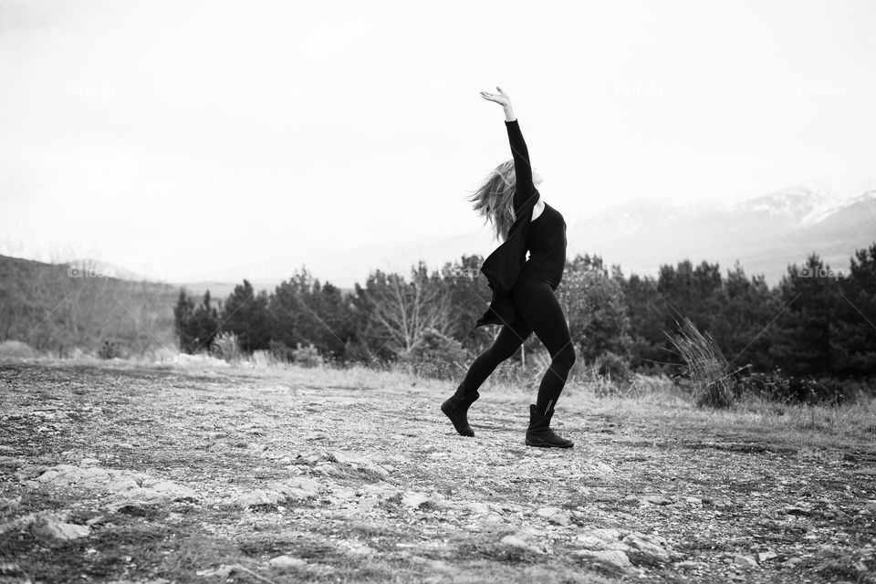 girl dancing on the mountain