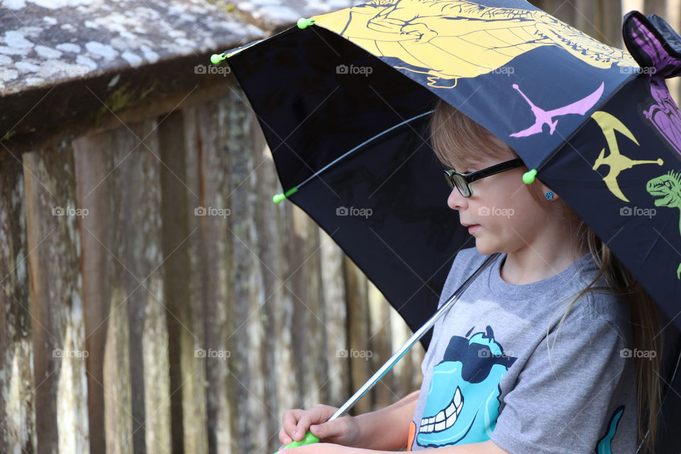 Child with umbrella