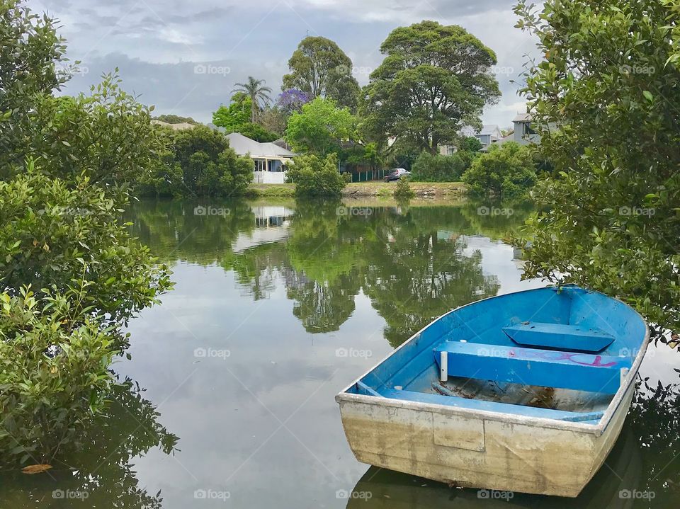 Boat in the water, Throsby Creek, Islington, Newcastle NSW Australia 
