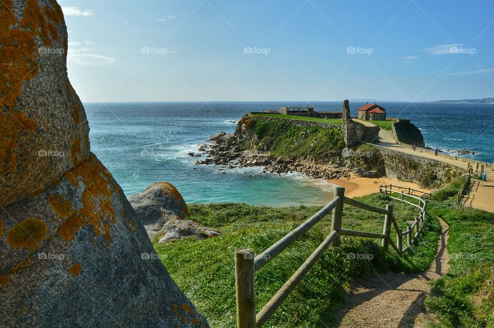 High angle view of cliff in sea