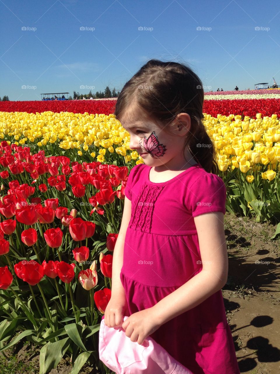 Child with tulips