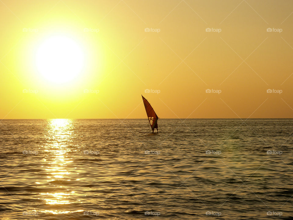 Surfer at sunset