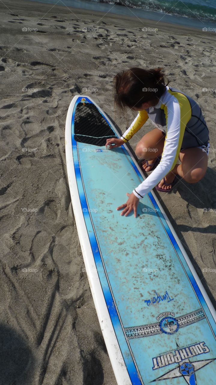 Preparing to surf in San Juan, La Union Philippines