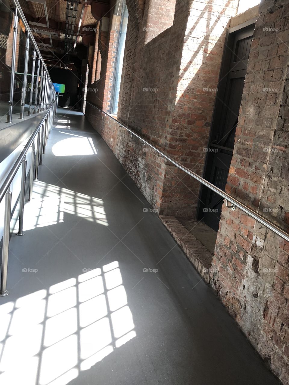 Brick glass and metal walkway