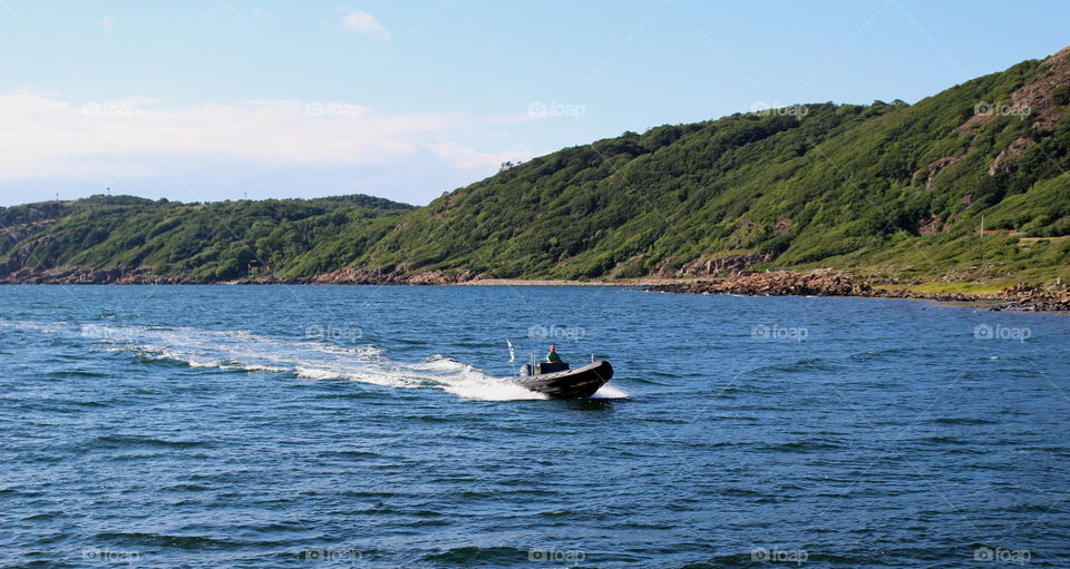 Boat in landscape of Mölle in Skåne Sweden.