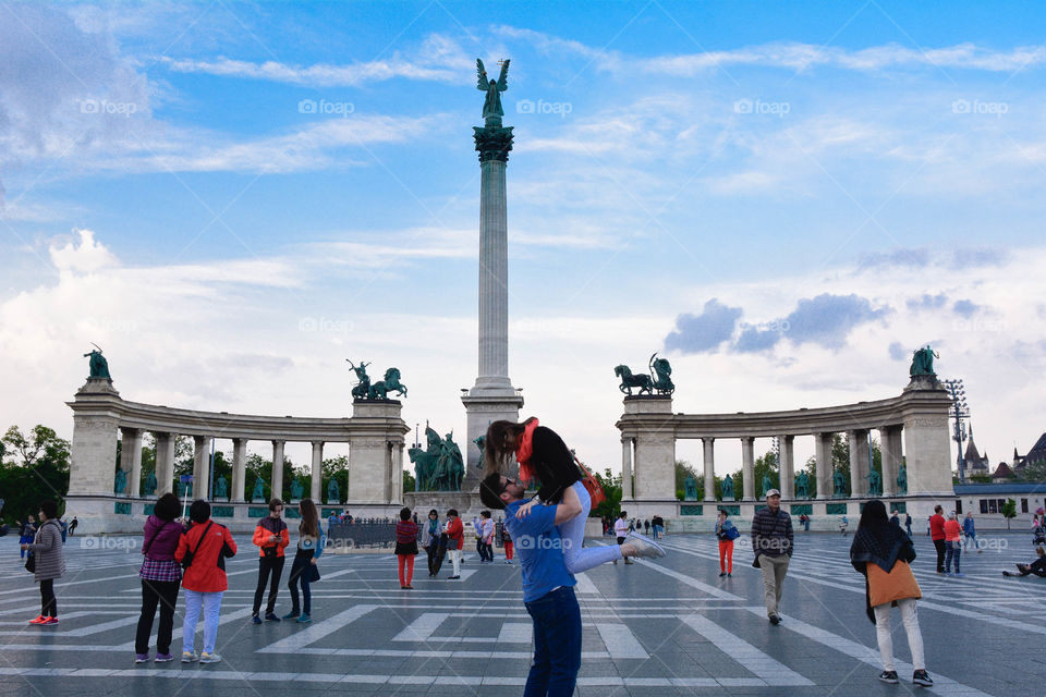 Young couple on Heroes Square in Budapest, Hungary