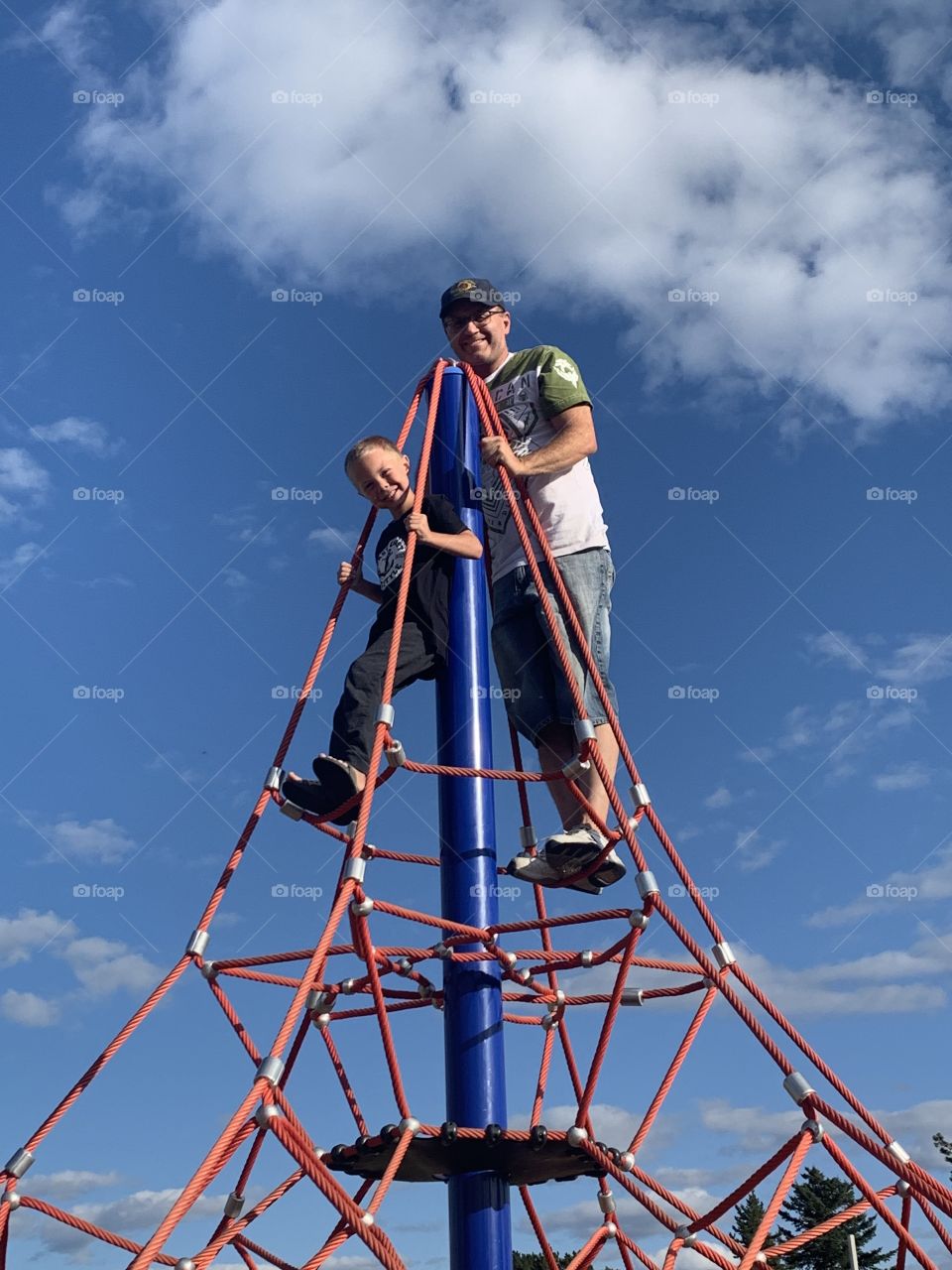 Father and son at the playground 