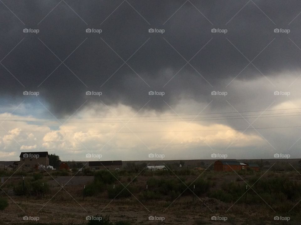 Storm cloud above the farmhouse 