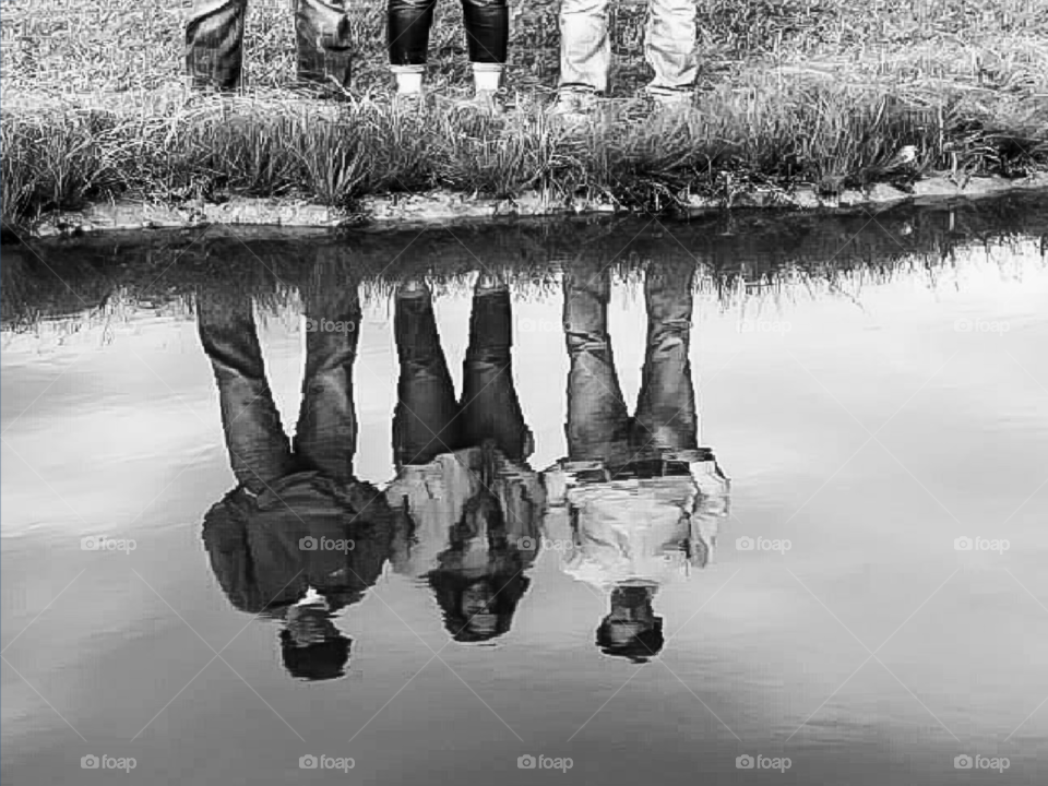 mirror image people water reflections mono chrome