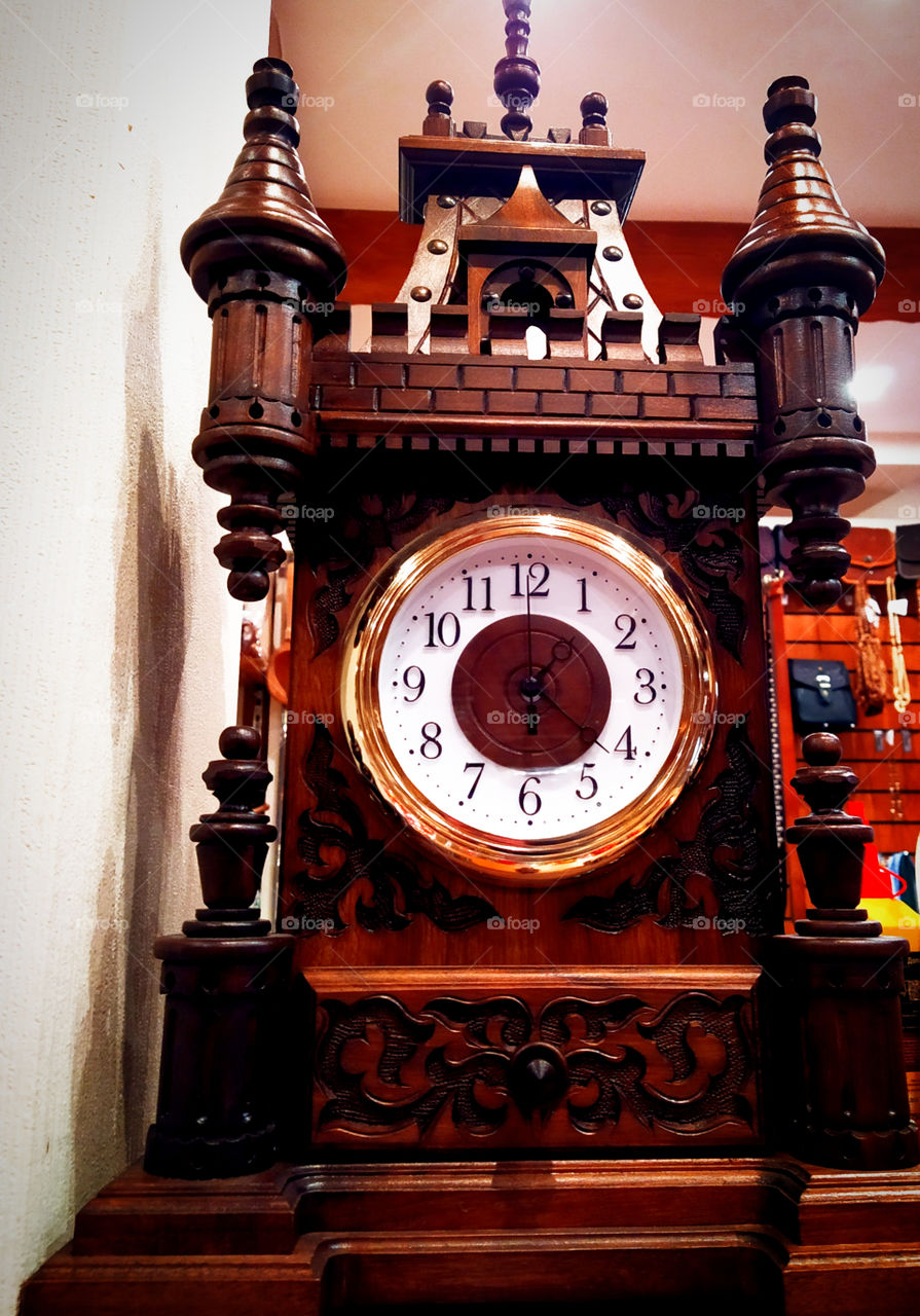 Clock.  Wooden clock case in the form of a medieval castle