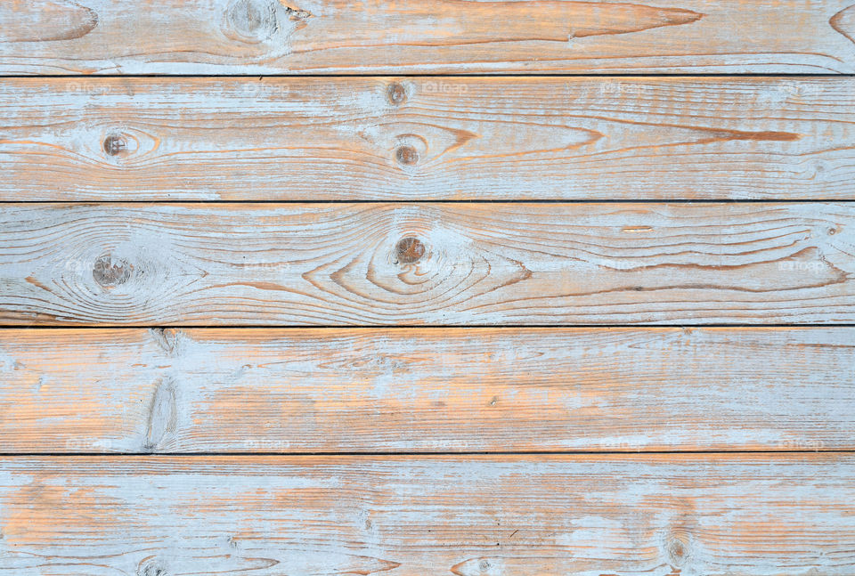 Empty copy space wooden background with a little blue grey paint