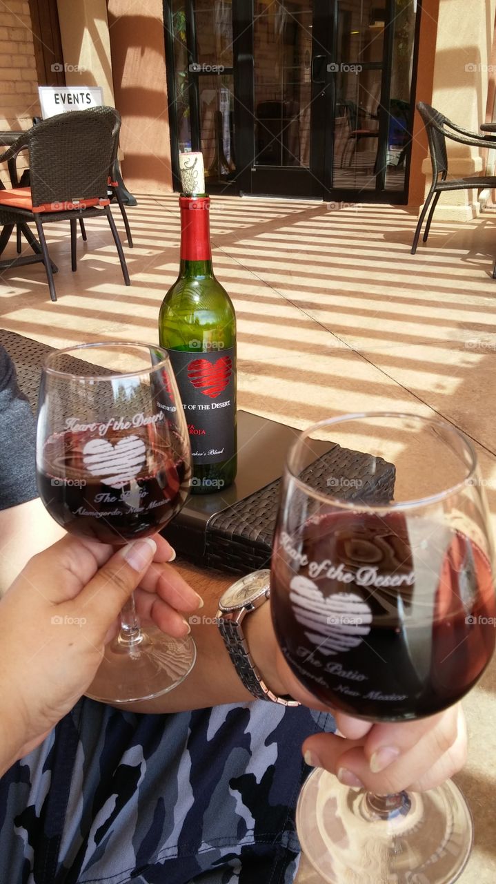 enjoying a red at a local winery