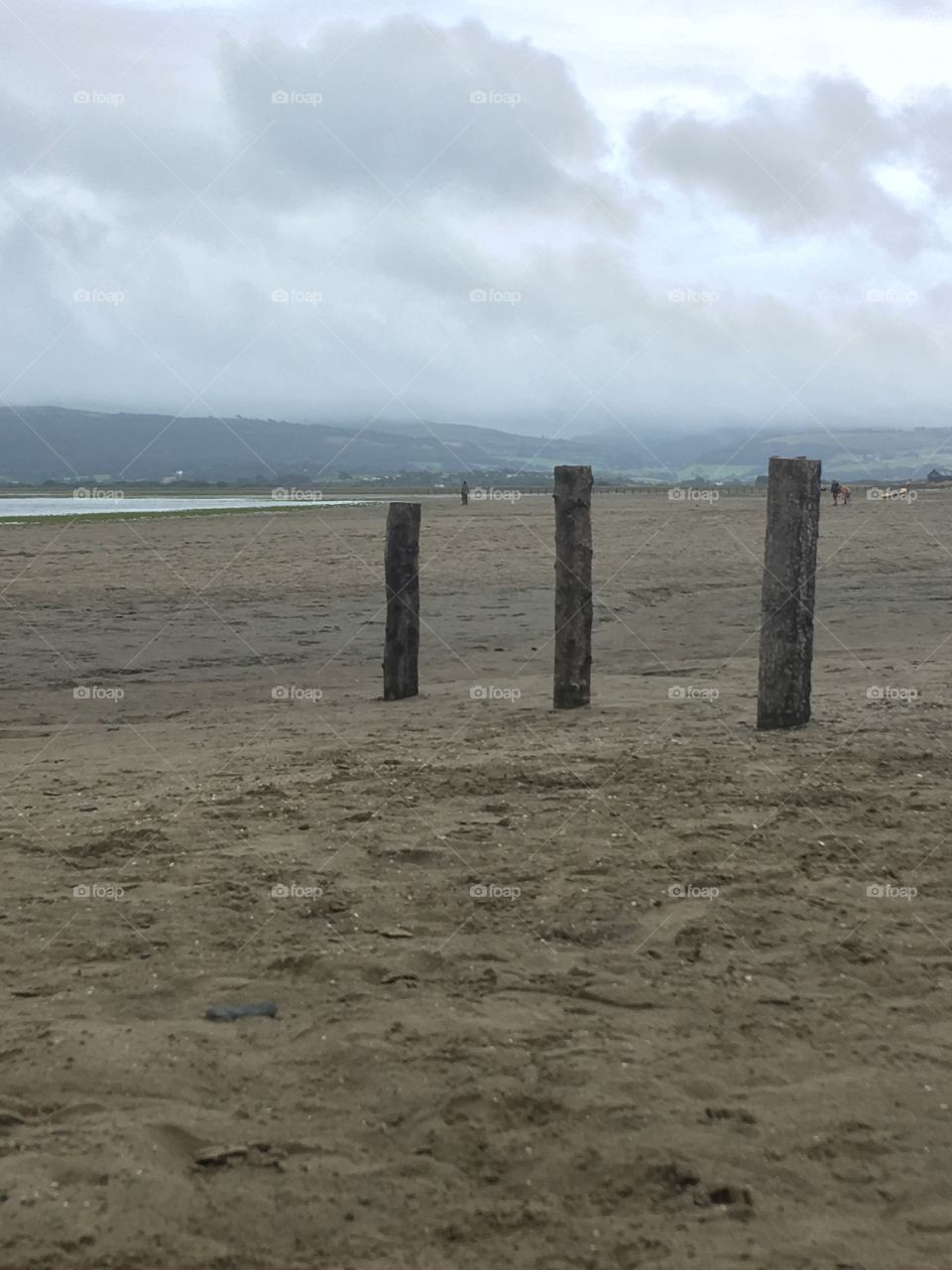 Pillars in sand 