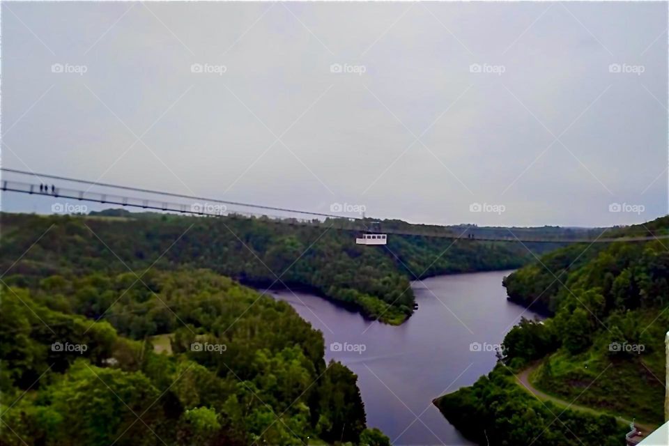 This is the „Rappbode Dam“ near „Oberharz“ in „Harz“, „Saxony-Anhalt“ in former „East Germany“. A very long hanging bridge leads across the reservoir. 2024. Hypnotic Productions