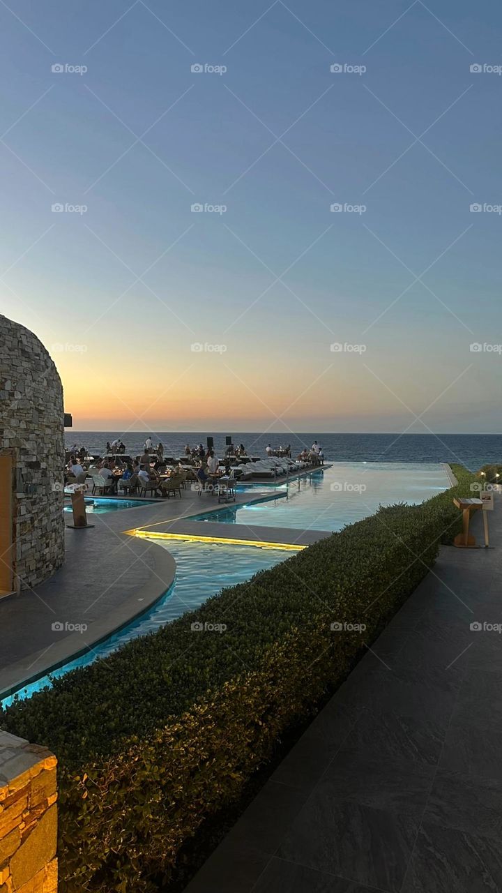 Golden hour, good company, and a view that speaks luxury.