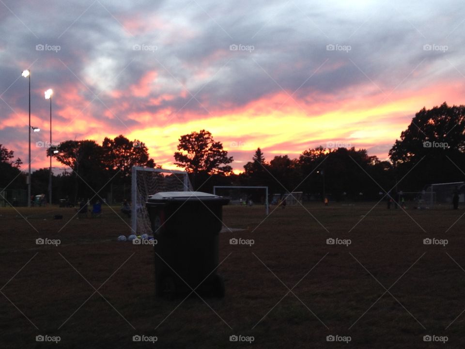 Sunset over soccer field 