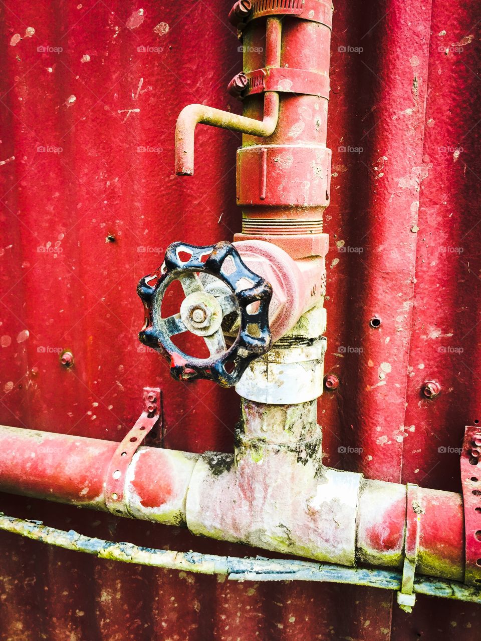 Rustic Water Pipes. Water pipes used on a farm produce washing line.