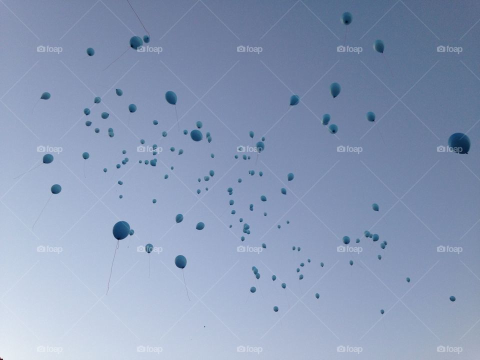 Balloons flying.