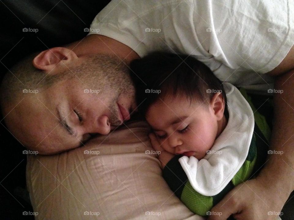 father and son . sleeping