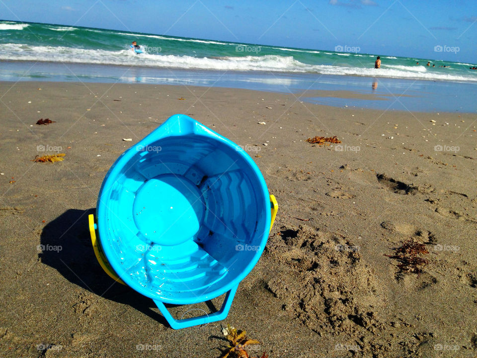 Bucket on sand at beach, Hollywood Beach, Florida