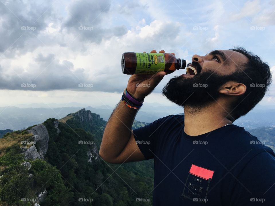Sri lanka katusu konda mountain. Drink  asamodagam. Beard boy. smile . no editing 