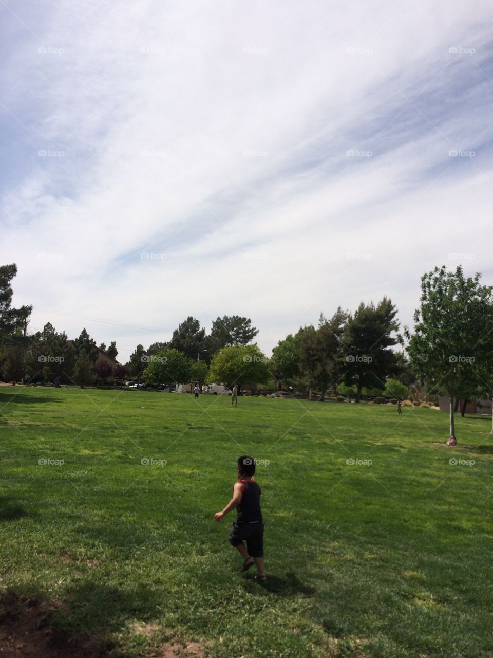 Park. Toddler in the park running 