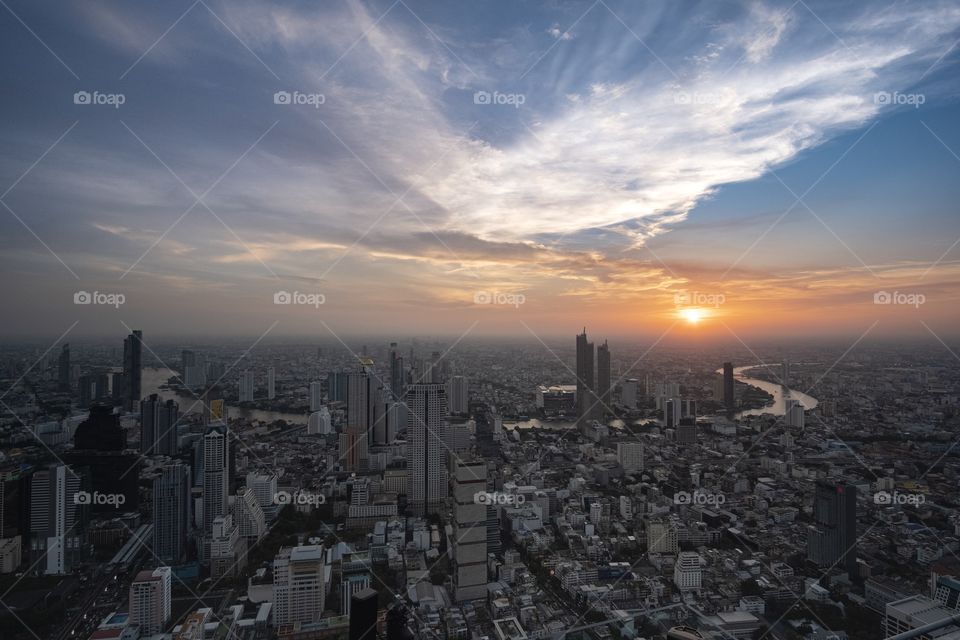 Romantic sunset in the central city Bangkok Thailand , photo from the roof top of King Power MahaNakhon