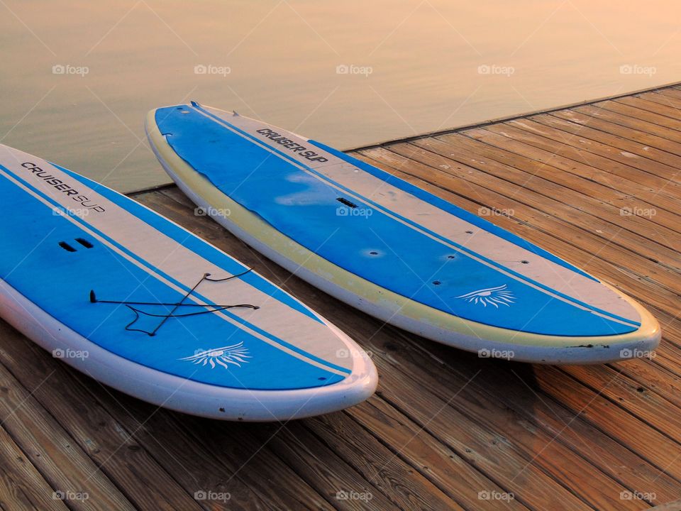 Paddleboards by the lake.