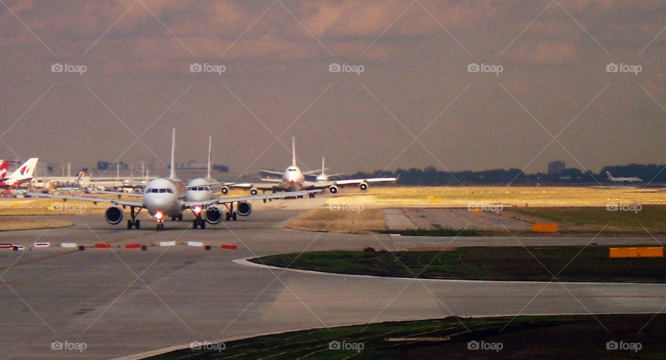 Jet airplanes waiting for clearance to take off at Heathrow
