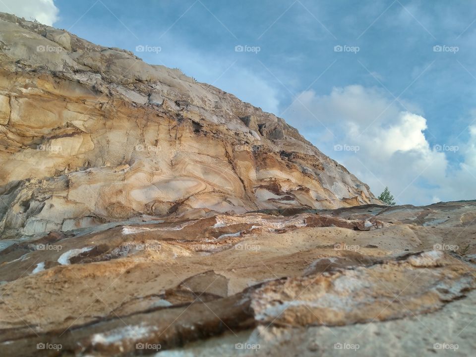View of beautiful sky at the top of rock.