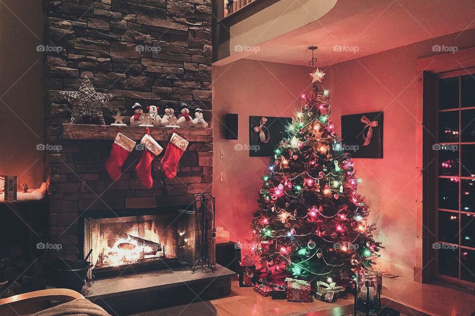 Christmas tree and fireplace on Christmas Eve 