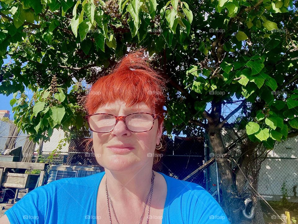 Funny looking with hair blown up into the air this is me, “Petra Schiller” a.k.a. “Maxine Firefox” a.k.a. “Maximiliane Feuerfuchs” aboard the “Salvation”, a “28 ft 1969 Luhrs” cabin cruiser moored at “Newtown Creek”. 2023. Hypnotic Productions