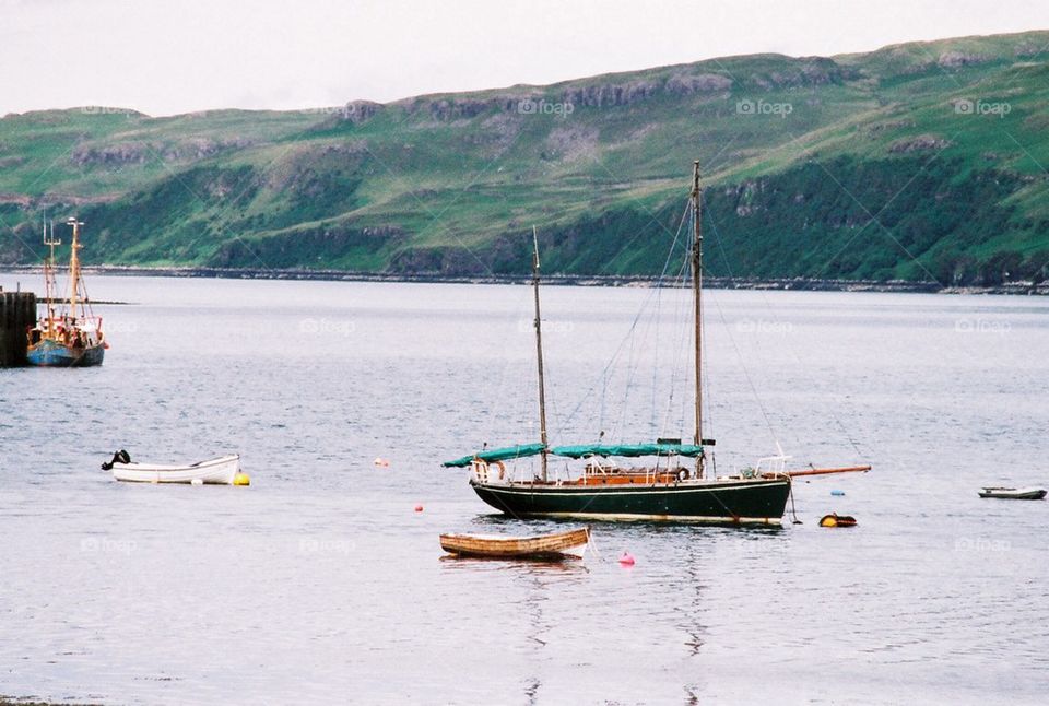 Sailboats in Scottish inlet