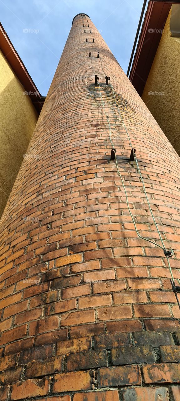 cheminée brique hauteur architecture Suisse