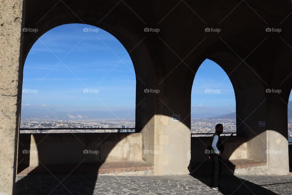 Arch windows with Napoli view