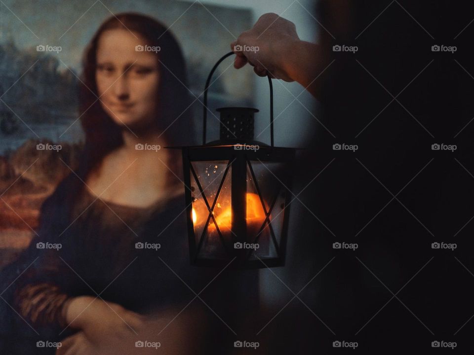 Mona Lisa by Leonardo da Vinci Person Holding Lantern