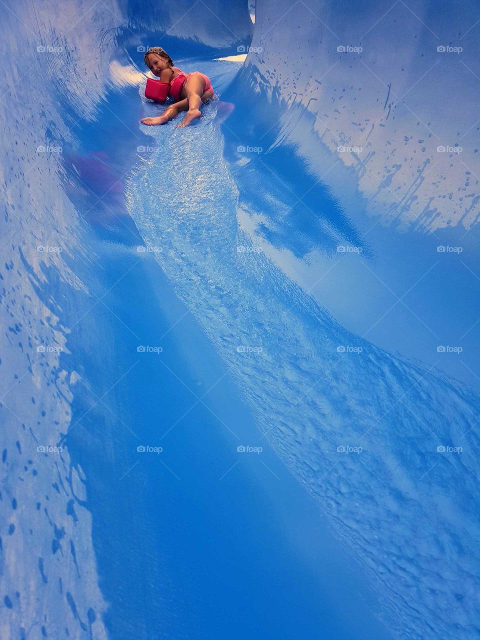 Girl on a water slide