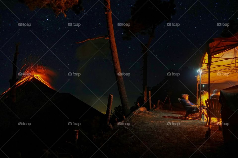 Best campsite ever, with one of the most epic views I've seen in my life...Acatenango volcano erupting while everybody is gathered around the bonfire