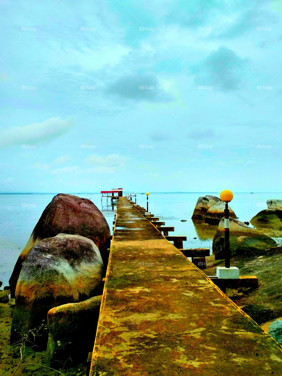 Perspective bridge to the sea shore