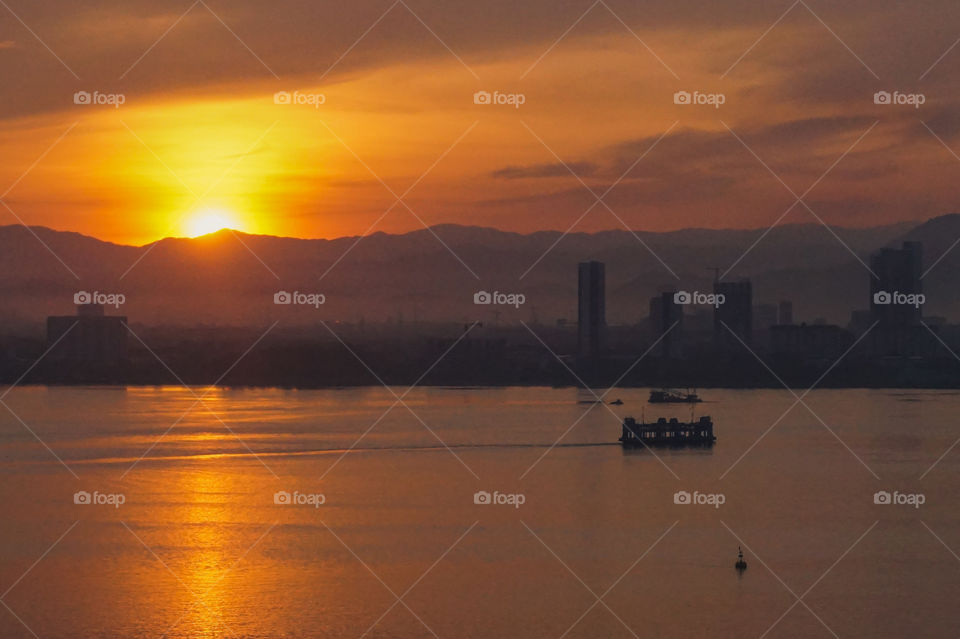 Sunrise ferry crossing from mainland Malaysia to the island of Penang