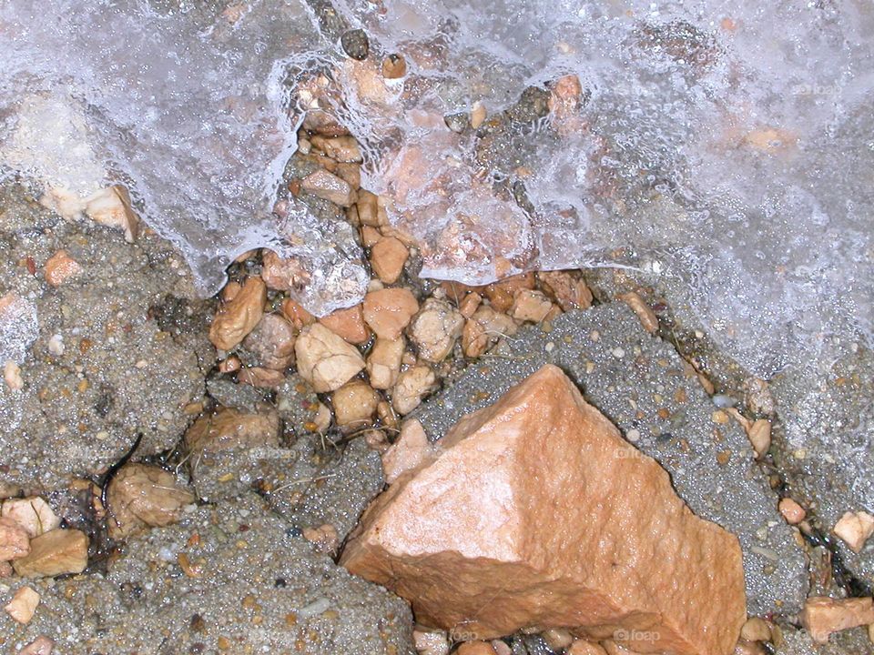 Frozen water high up in the mountains during winter