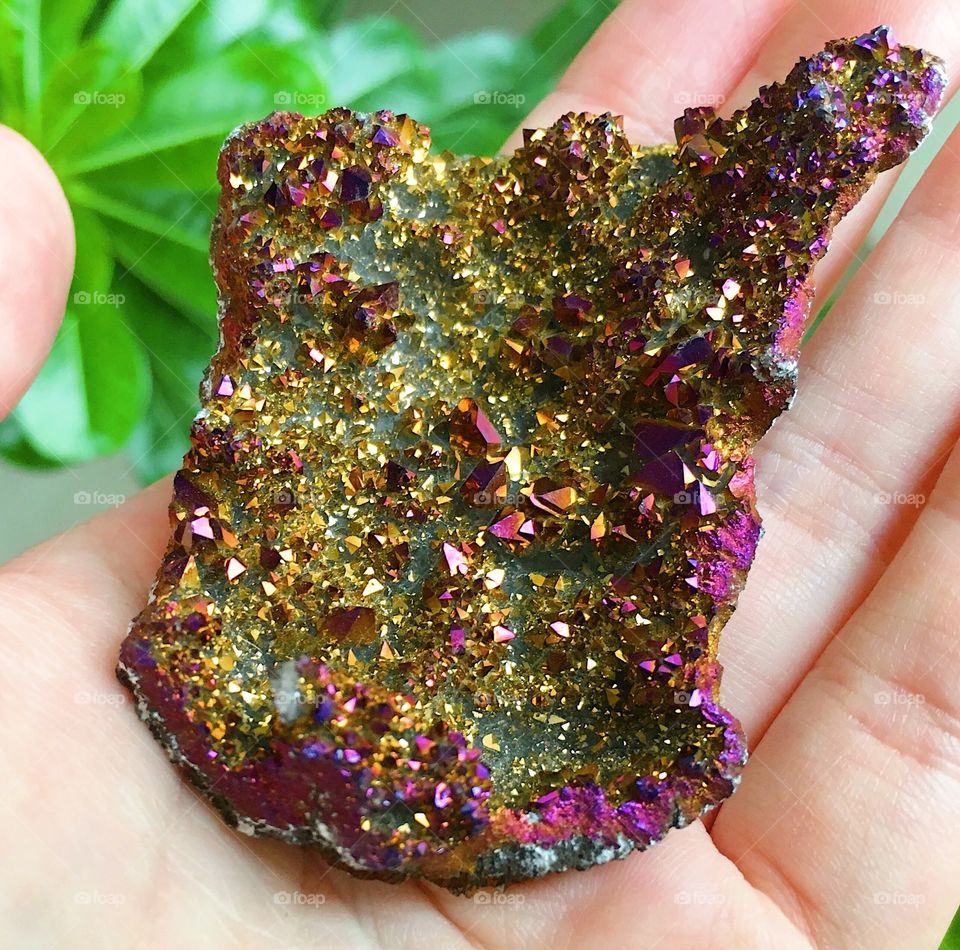 A gold and purple aura quartz druzy cluster rough specimen.