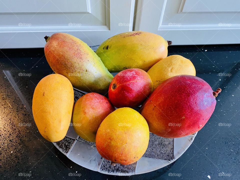 Nothing says summer like a bowl of delicious, juicy, sweet mangoes. Yum!