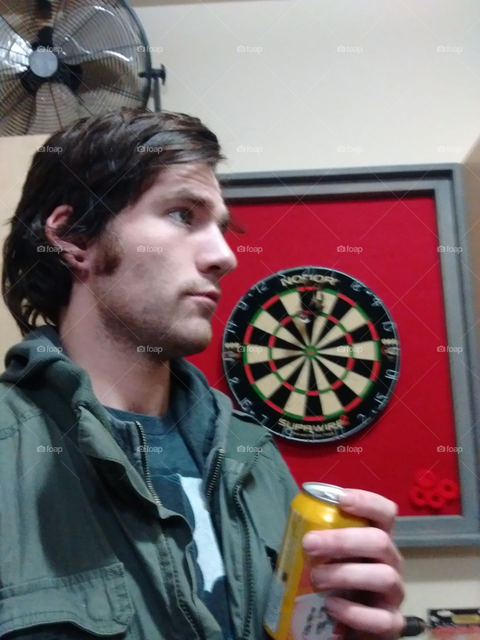 dart board and beer