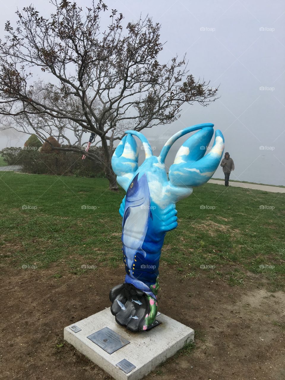 Lobster original artwork creation along Plymouth, MA tourist ocean front. Fog covered.