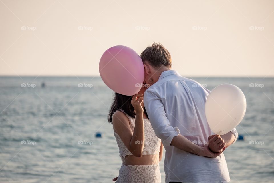 The good moment of young couple so sweet at the beautiful beach in Thailand